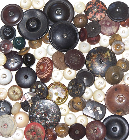 a collection of whistle buttons